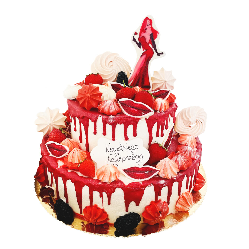 Piętrowy biały tort z czerwoną polewą, zdobiony bezami, oraz napisem Wszystkiego Najlepszego.